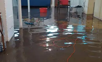 Basement with boiler, cabinets and washing machine completely flooded in Arlington, TX
