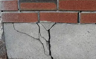 Concrete foundation with serious structural damage in Arlington, TX