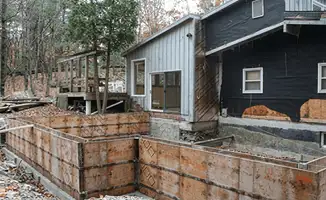 Prepared site with foundation forms for home remodeling and addition project in Arlington, TX